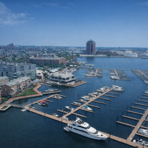 Aerial view of Lighthouse Point Marina in Baltimore, Maryland featuring dockage and waterfront slips along the Inner Harbor.
